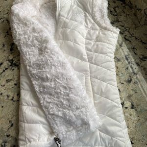 New!  soft fur inside, it’s a reversible vest